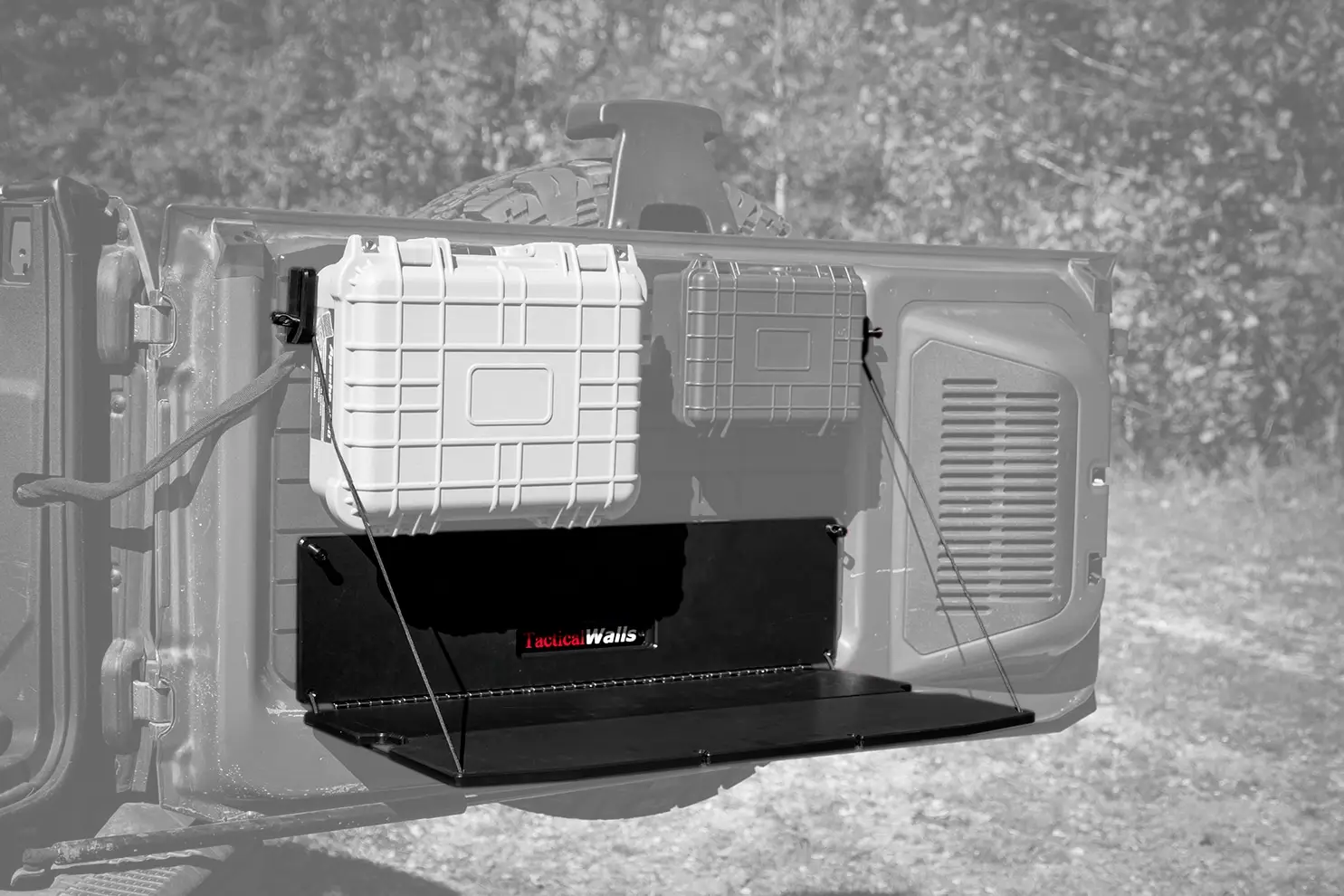 Ford Bronco Tailgate Table Grayscale-style view of the Ford Bronco Tailgate Table deployed as a workspace with two storage cases attached to the tailgate system.