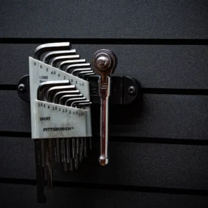 ModWall Hide-A-Mag A set of Allen wrenches and a metallic socket wrench magnetically staged on a BroCo vehicle panel, showcasing how the ModWall Hide-A-Mag keeps essential tools accessible and secure.